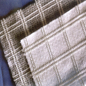 Geomalla compuesta de filamento de vidrio para refuerzo de capa superficial