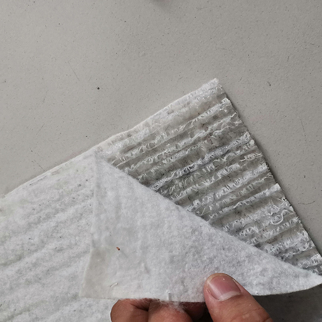 Geocompuesto de drenaje 3D en forma de onda para drenaje de campos de fútbol debajo del césped artificial